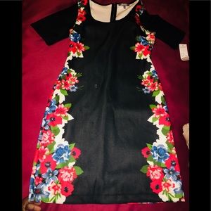 Black background with floral side print dress
